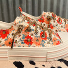 FLIRTY FLORAL SLIP ON SNEAKERS