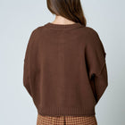 RAW EDGE EXPOSED SEAM BUTTON DOWN KNIT CARDIGAN