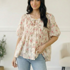 With a Rosy Glow Cream Pleated Top