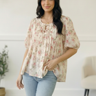 With a Rosy Glow Cream Pleated Top