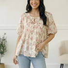 With a Rosy Glow Cream Pleated Top