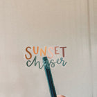 "Sunset Chaser' handlettered clear sticker
