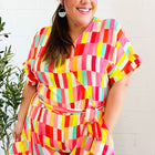 Eyes On You Coral & Yellow Geo Abstract Surplice Woven Romper