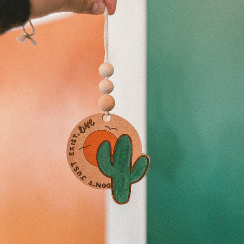 'Don't Just Exist, Live' Car Charm