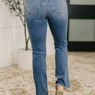Maureen High Rise Distressed Bootcut Jeans