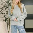 Petal Poise Floral Applique Pullover in Ivy