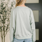 Petal Poise Floral Applique Pullover in Ivy