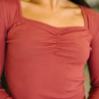 The Girls are Back in Town Long Sleeve Top in Burgundy