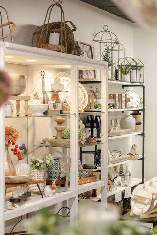 Home decor shelves with vases, candles and seasonal pieces at The Willow Collective