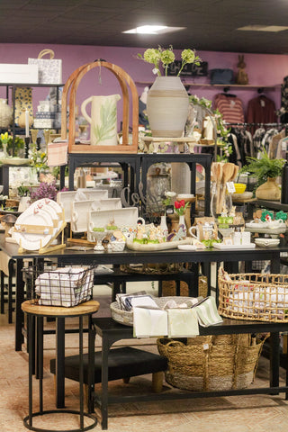 Home decor and kitchen table display with vases, platters and baskets at The Willow Collective